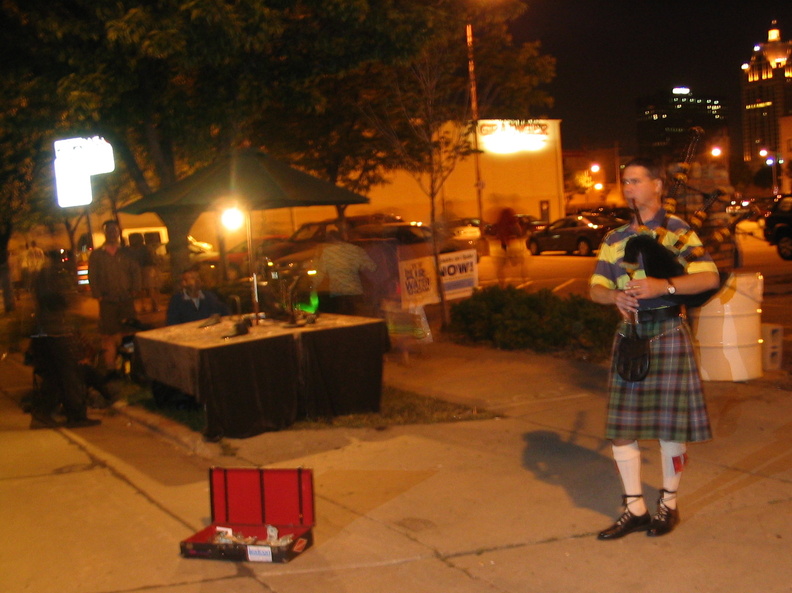 As we left around midnight we ran across this bagpipe player on the street. It was surreal enough for me to toss him a buck or two. IMG_1895.jpg