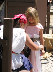 Hannah getting harnessed